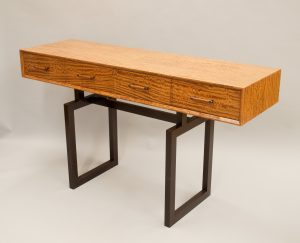 console in satinwood on a wenge base