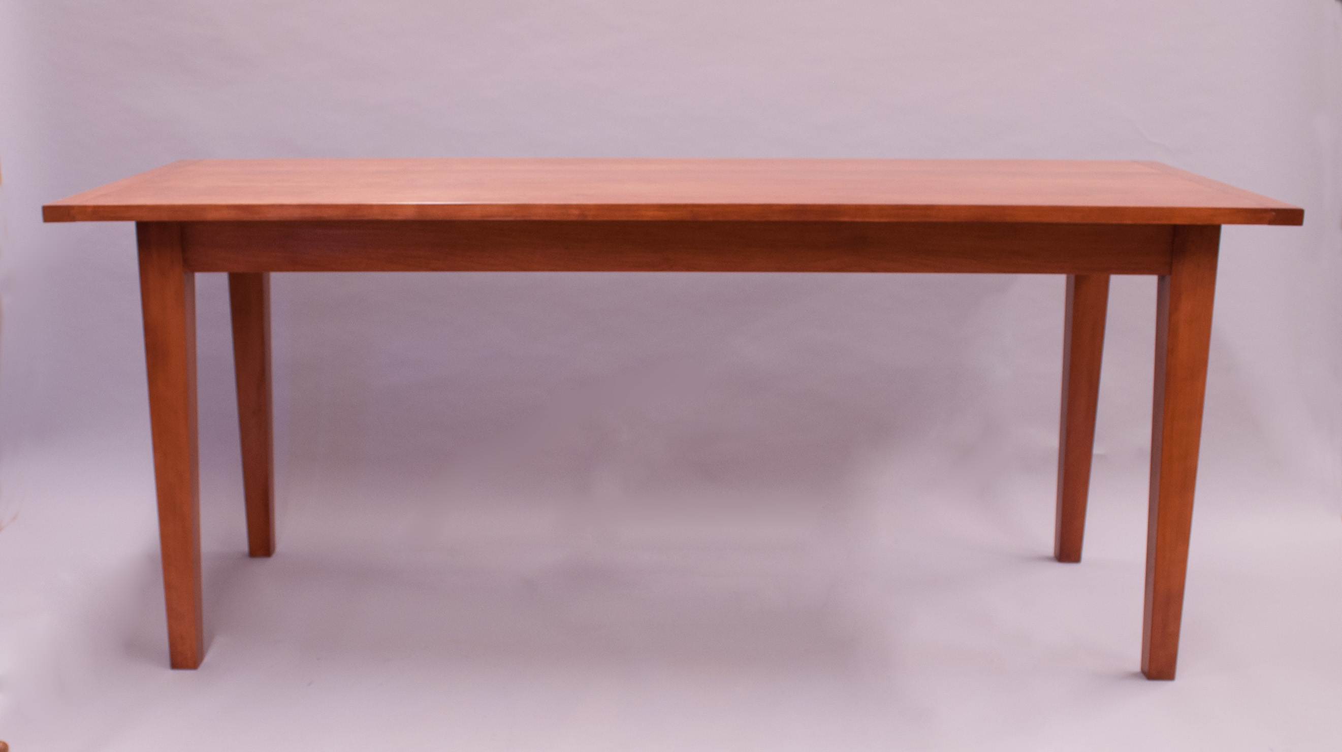 tapered leg table in cherry